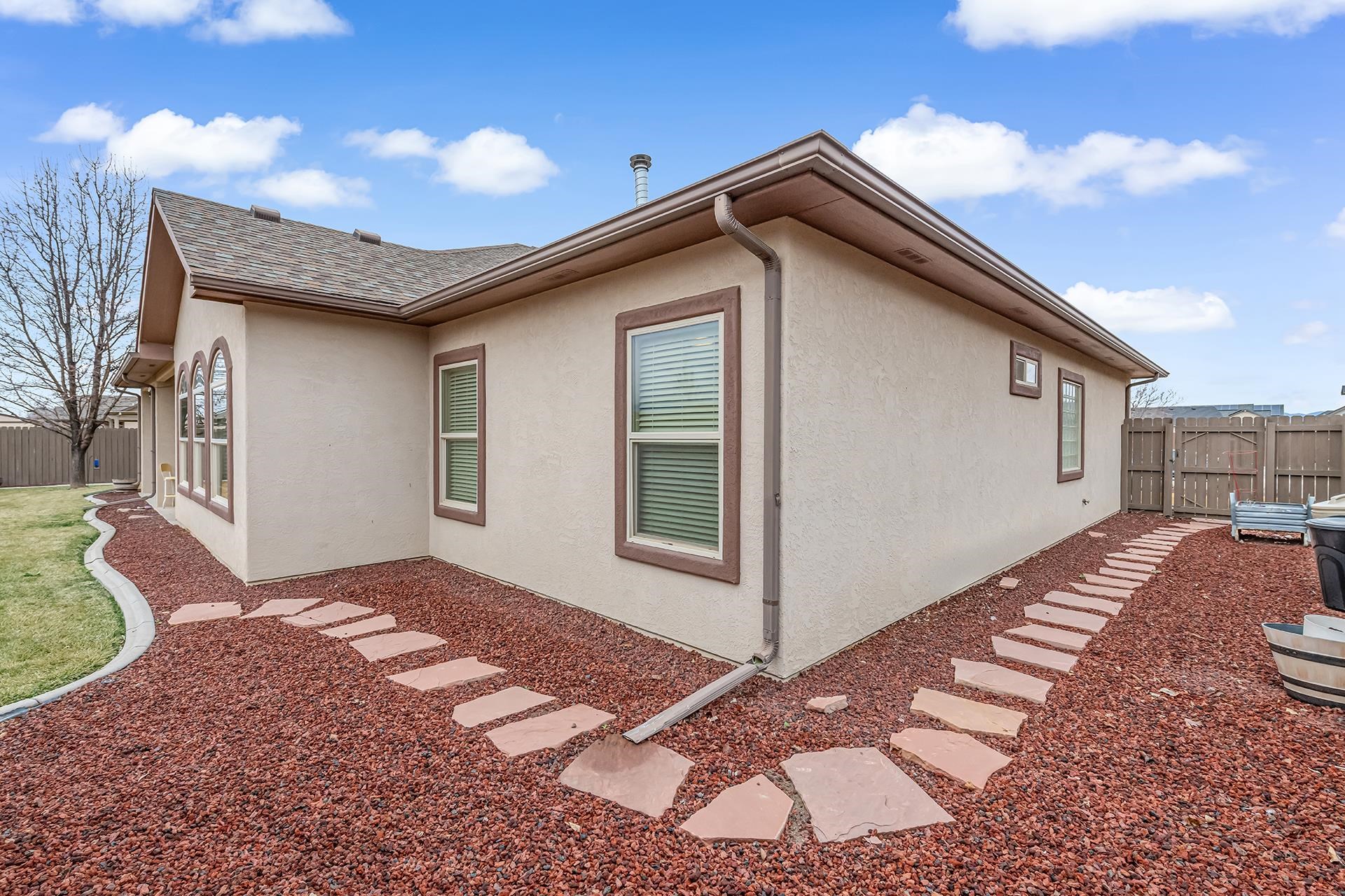 1660 Powis Lane Fruita, CO 81521 - Photo 25 of 38 a view of backyard of house