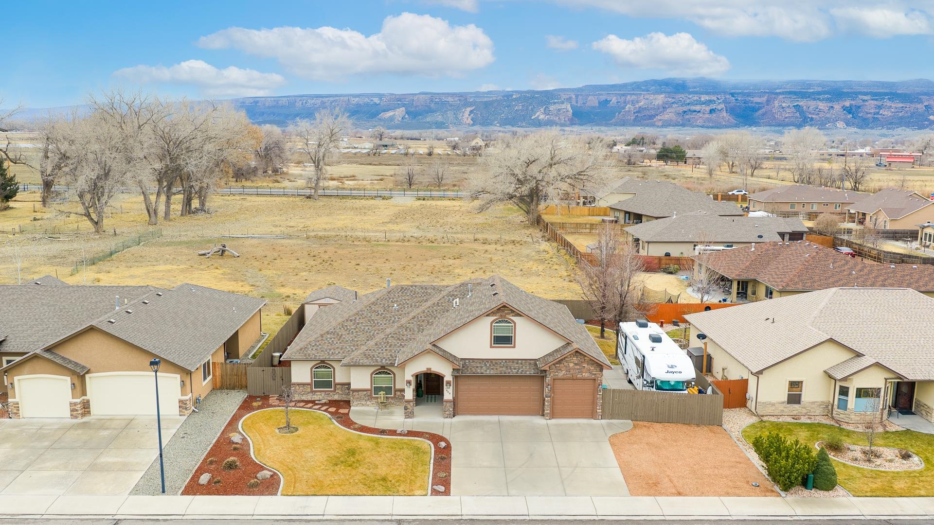 1660 Powis Lane Fruita, CO 81521 - Photo 29 of 38 an aerial view of residential houses with outdoor space