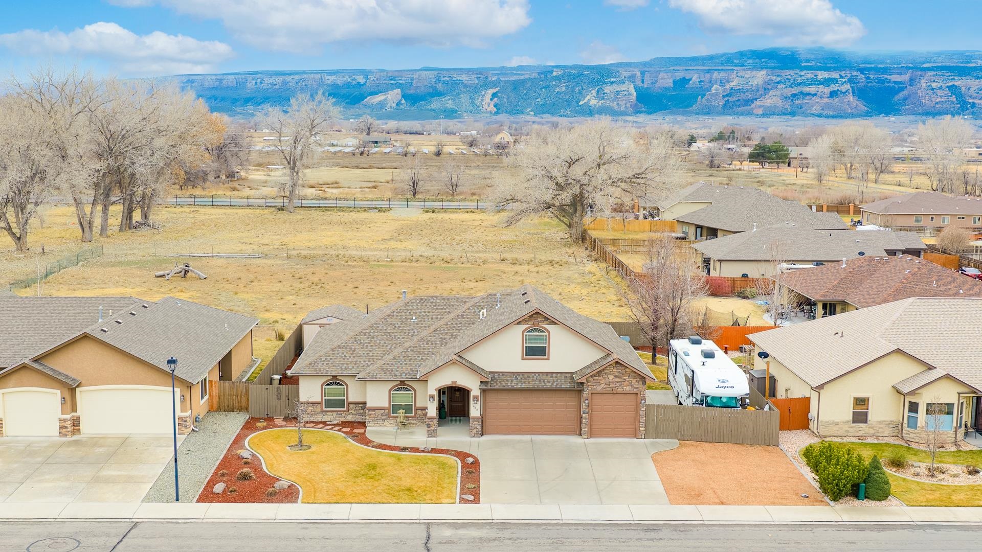 1660 Powis Lane Fruita, CO 81521 - Photo 30 of 38 a view of a city with an ocean view