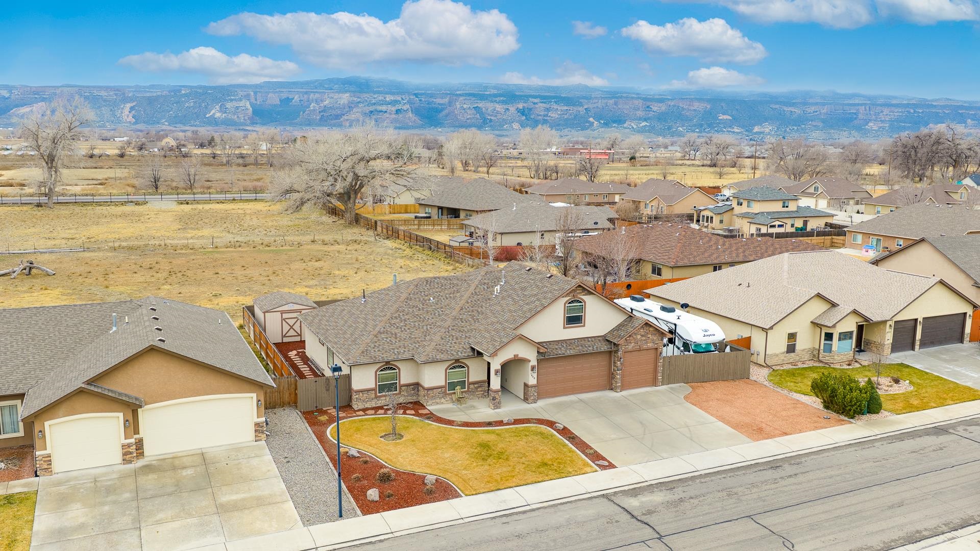 1660 Powis Lane Fruita, CO 81521 - Photo 31 of 38 a view of a city with an ocean