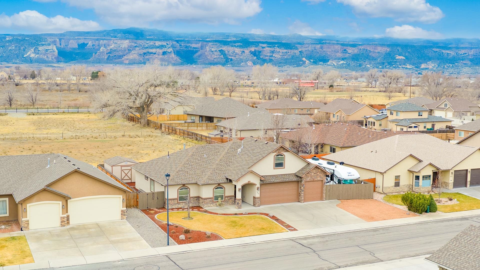 1660 Powis Lane Fruita, CO 81521 - Photo 32 of 38 a view of a city with an ocean