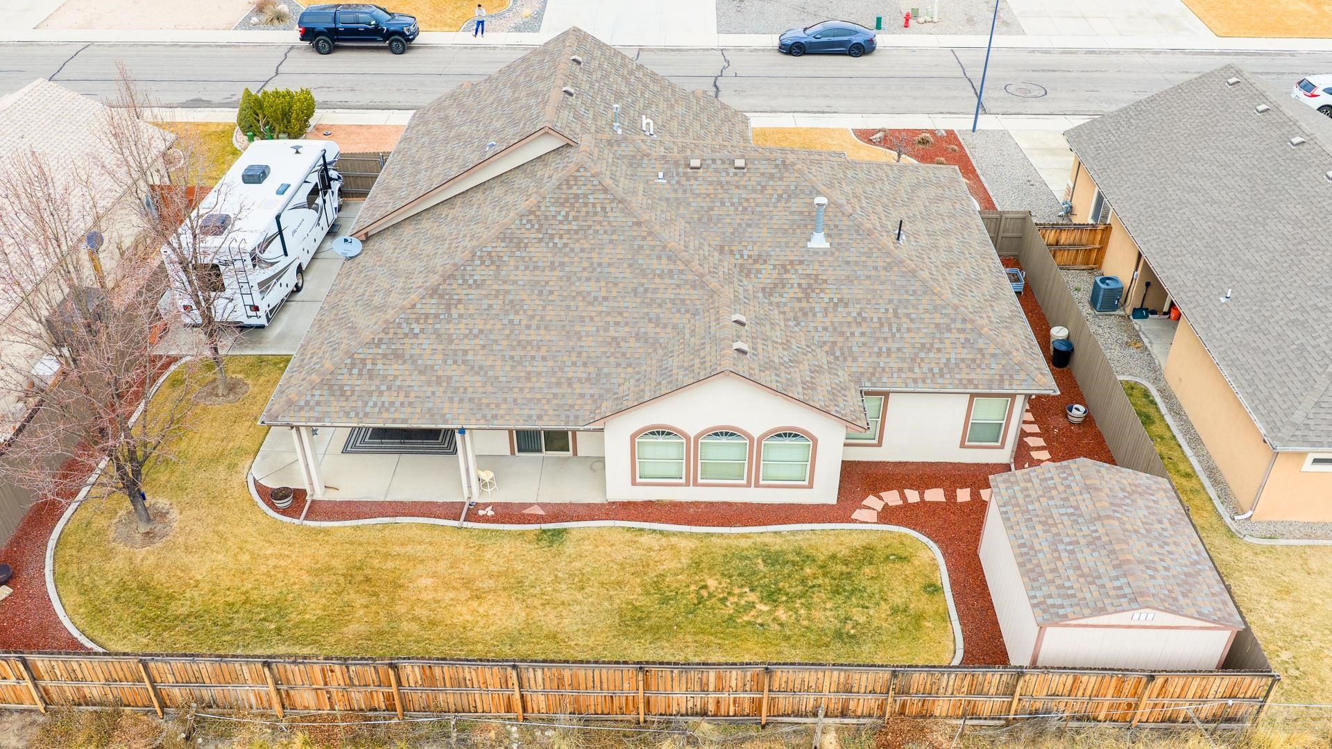 1660 Powis Lane Fruita, CO 81521 - Photo 36 of 38 a building outdoor space with swimming pool