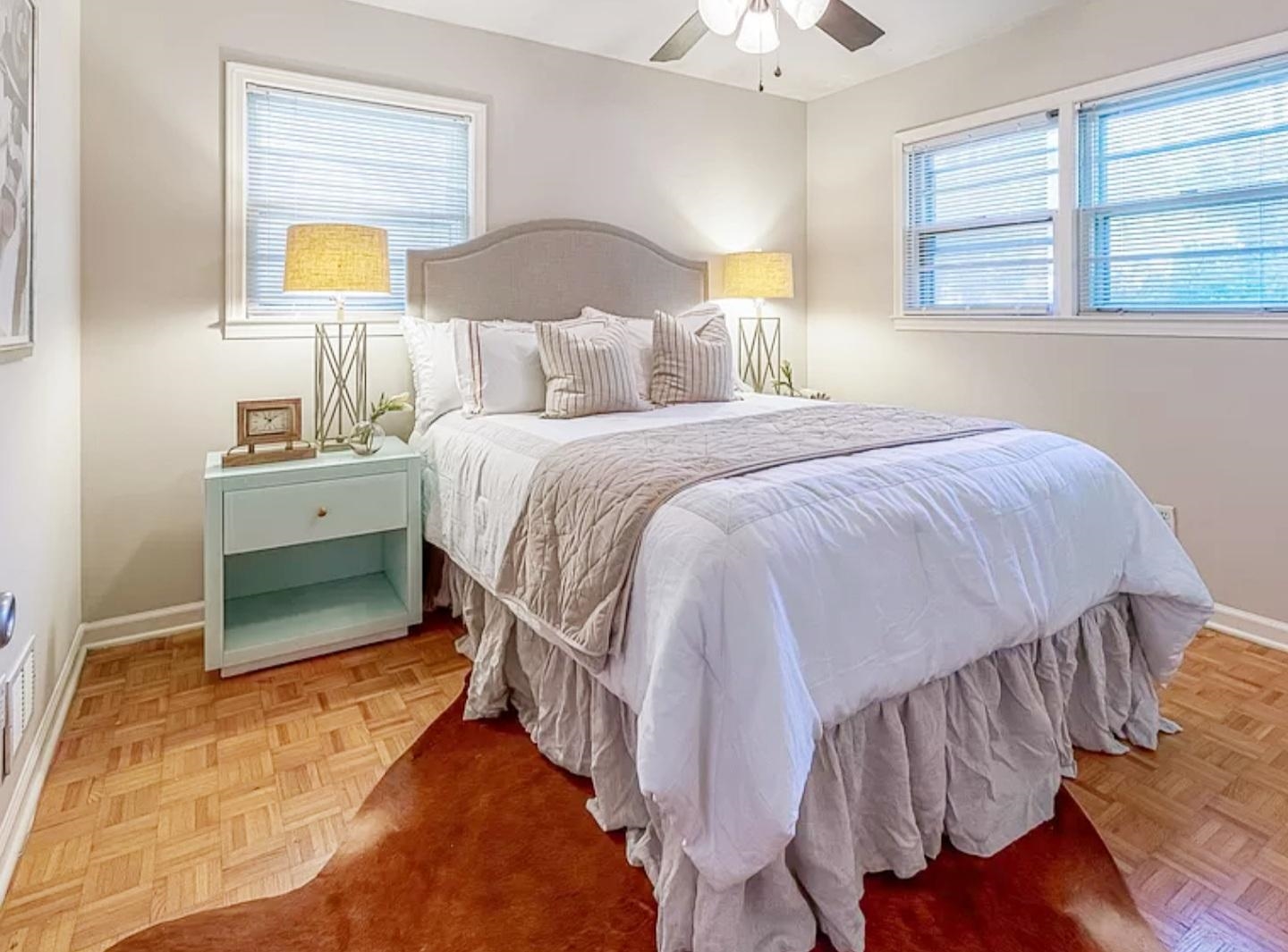 5298 Mesquite Road Memphis, TN 38120 - Photo 11 of 20 a bedroom with a bed and a painting on the wall