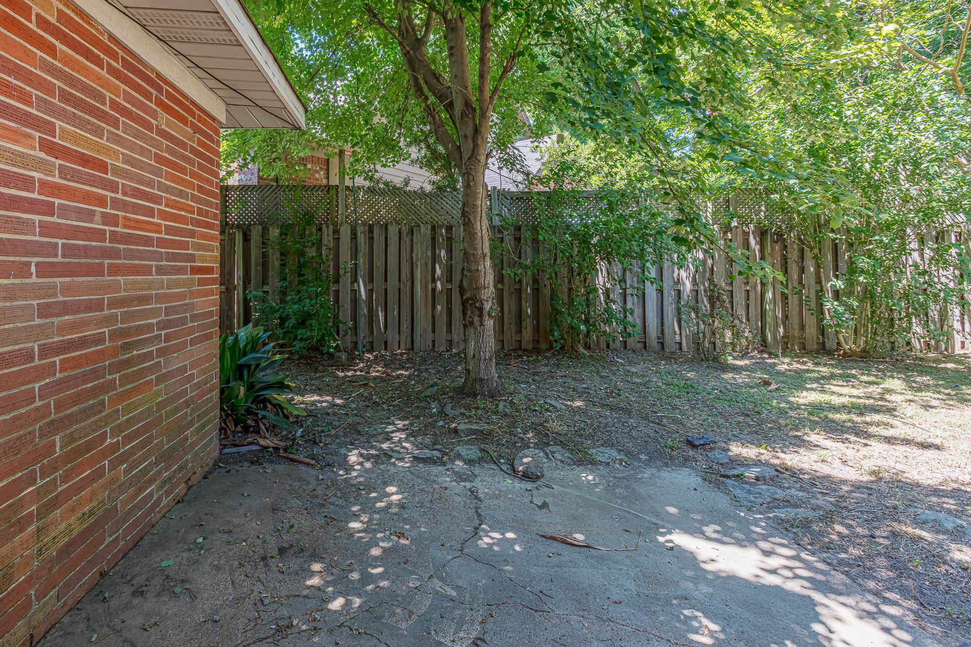 5298 Mesquite Road Memphis, TN 38120 - Photo 18 of 20 a view of backyard with green space