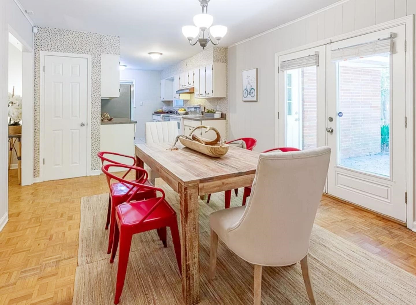 5298 Mesquite Road Memphis, TN 38120 - Photo 7 of 20 a view of a dining room with furniture and wooden floor