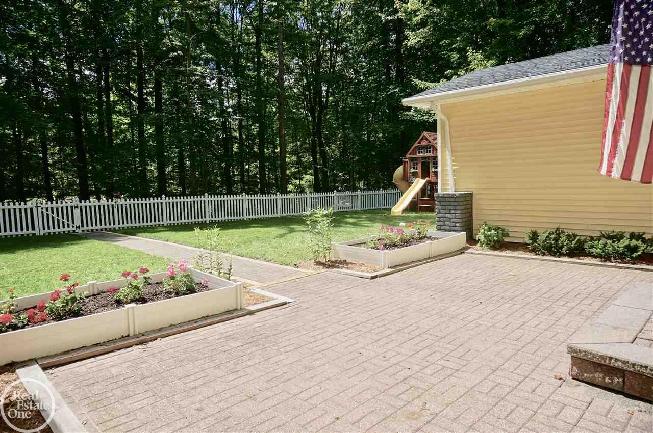 59955 Hayes Road Washington, MI 48094 - Photo 33 of 39 Large Inviting Patio