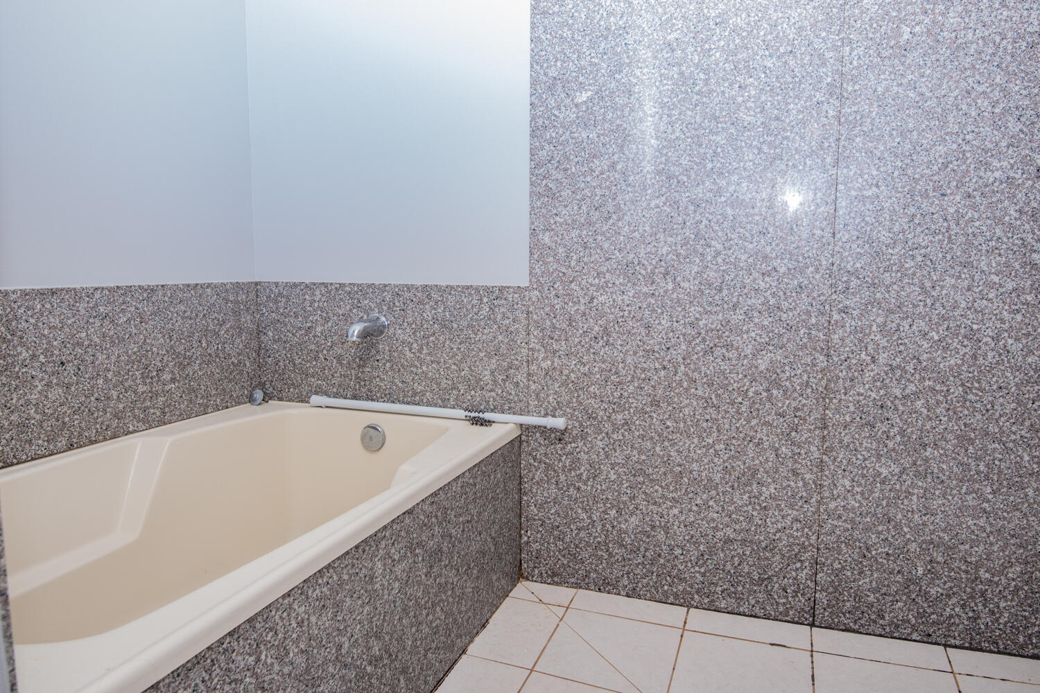 5265 Moore Loop Crestview, FL 32536 - Photo 16 of 25 a bathroom with a bathtub