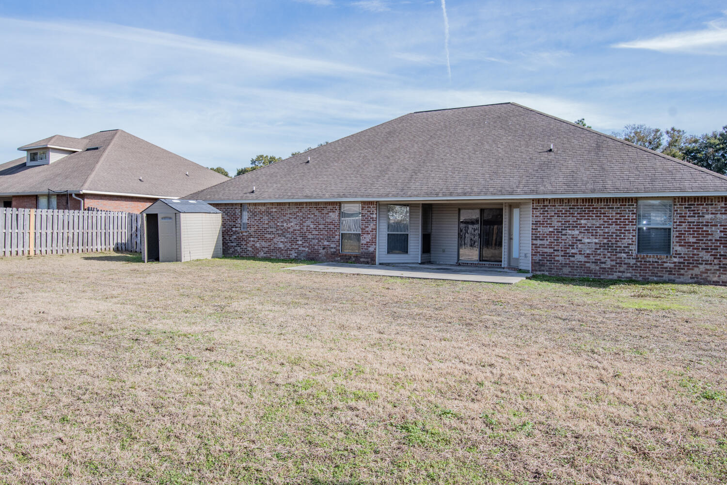 5265 Moore Loop Crestview, FL 32536 - Photo 23 of 25 front view of a house with a yard