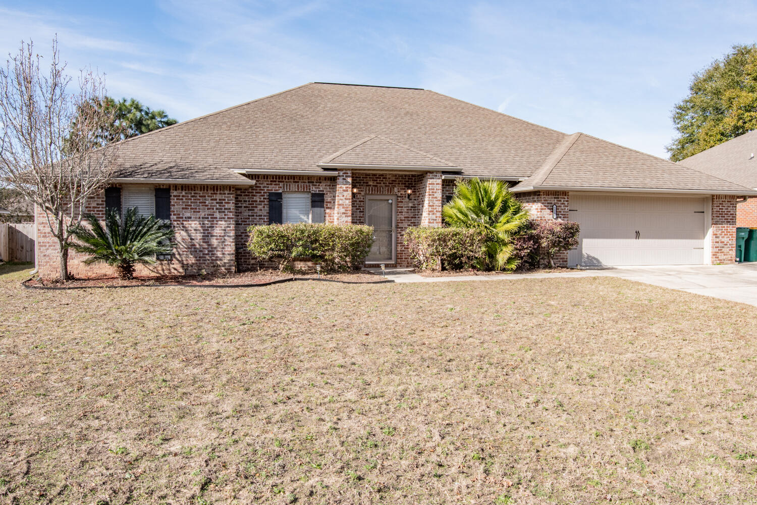 5265 Moore Loop Crestview, FL 32536 - Photo 24 of 25 a front view of a house with a yard