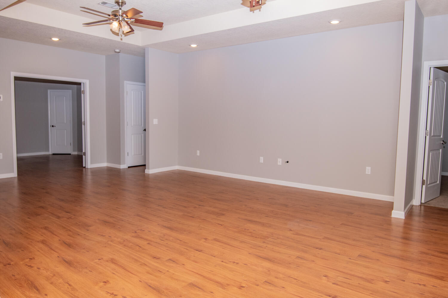 5265 Moore Loop Crestview, FL 32536 - Photo 4 of 25 a view of an empty room with wooden floor