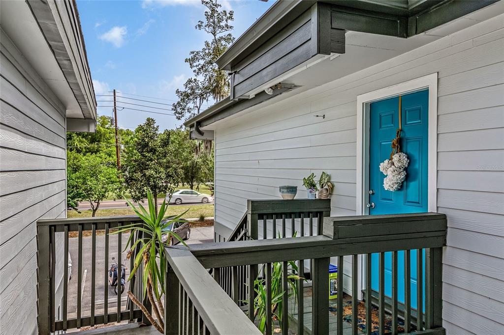 3555 Southwest 20th Avenue, Unit 15 Gainesville, FL 32607 - Photo 2 of 15 a view of a balcony with chairs