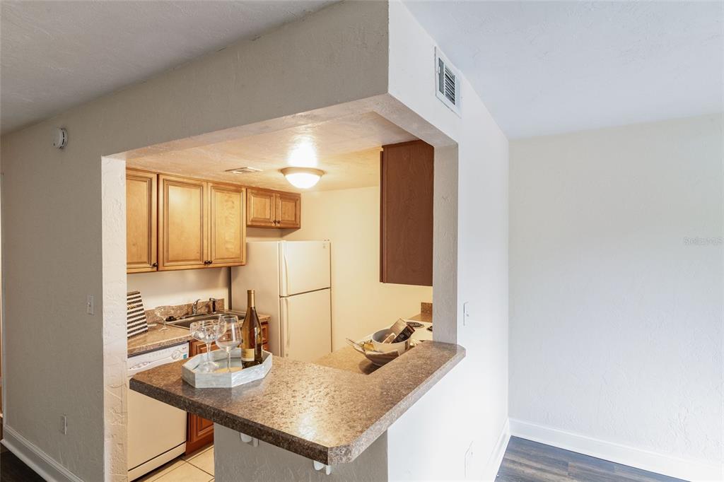3555 Southwest 20th Avenue, Unit 15 Gainesville, FL 32607 - Photo 9 of 15 a bathroom with sink and mirror