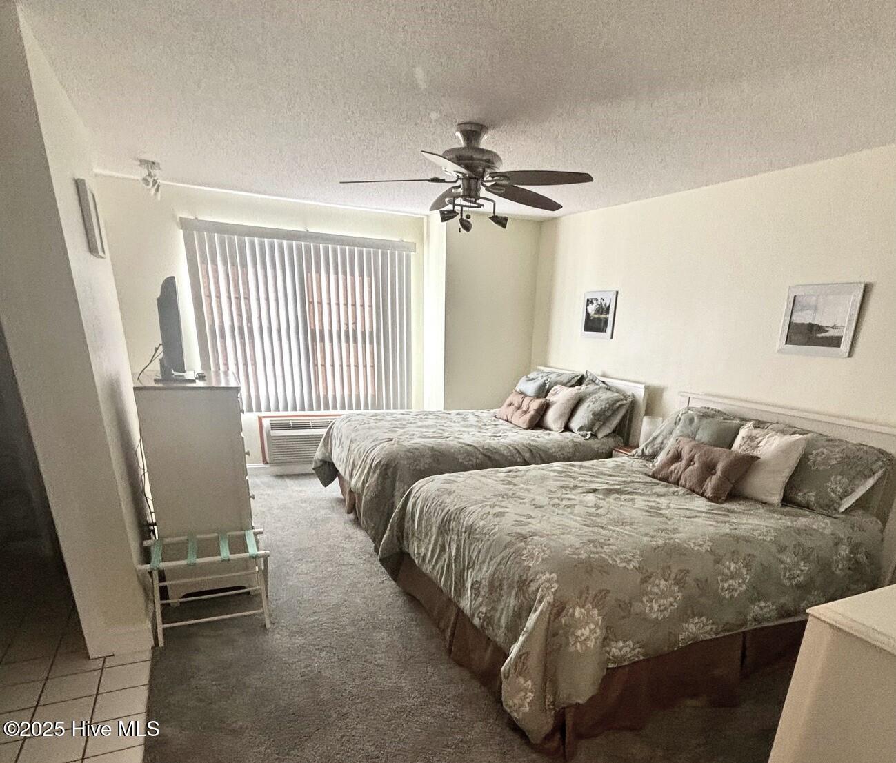 908 Resort Circle, Unit 512 Sunset Beach, NC 28468 - Photo 15 of 33 2nd Bedroom w/ 2 Queens_2