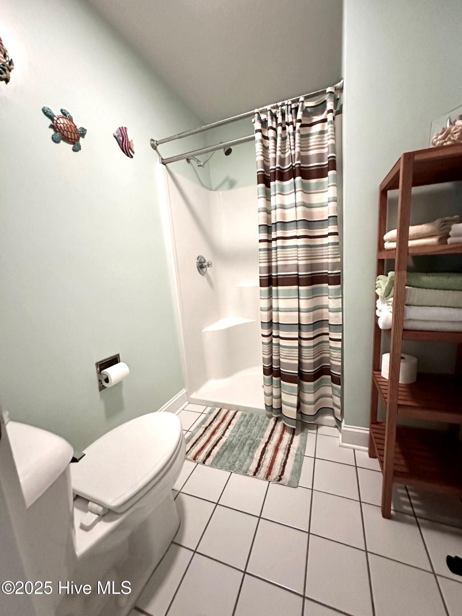 908 Resort Circle, Unit 512 Sunset Beach, NC 28468 - Photo 17 of 33 2nd Bedroom/Bath w/ walk-in shower