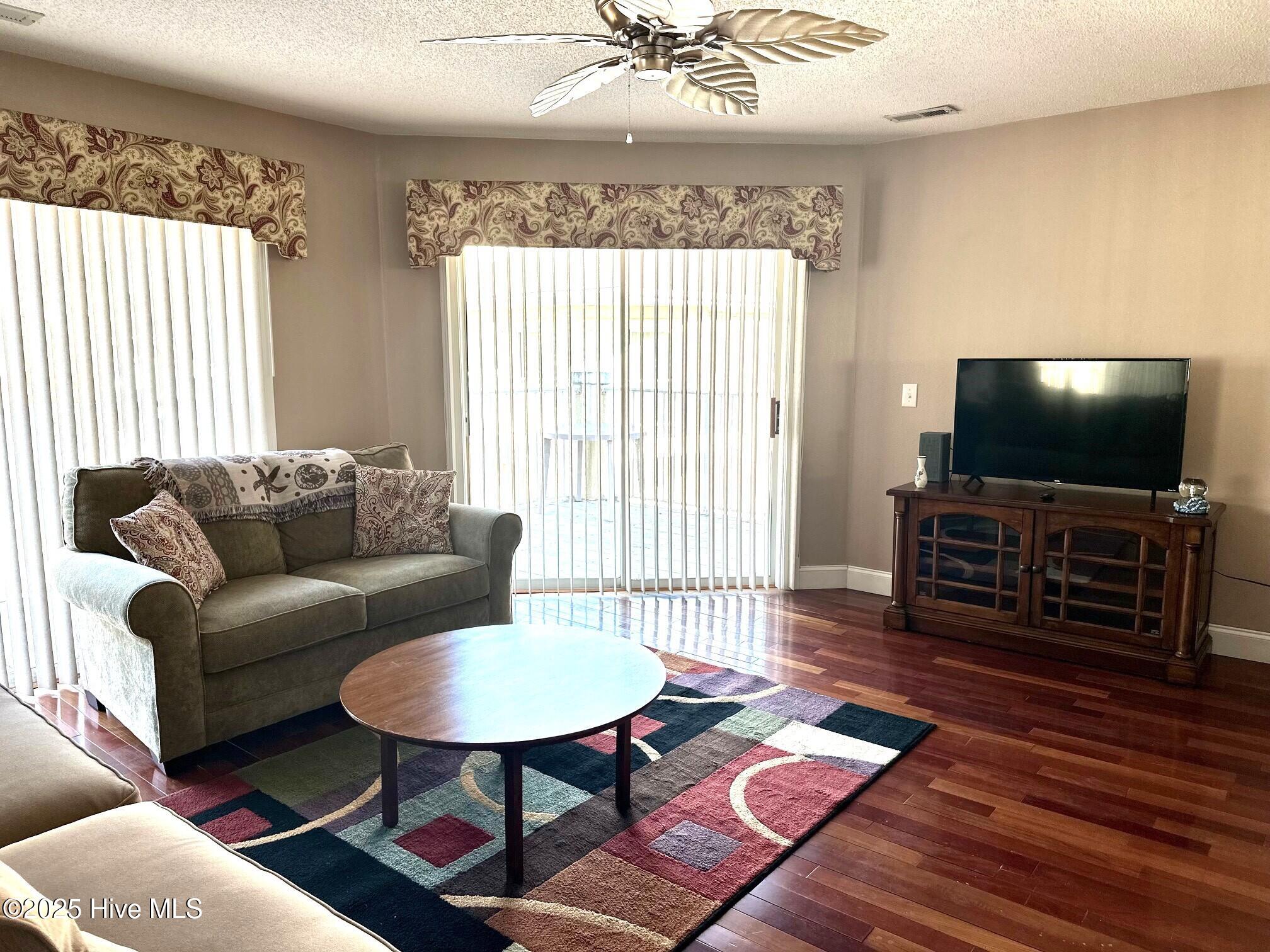 908 Resort Circle, Unit 512 Sunset Beach, NC 28468 - Photo 3 of 33 Living Room_2