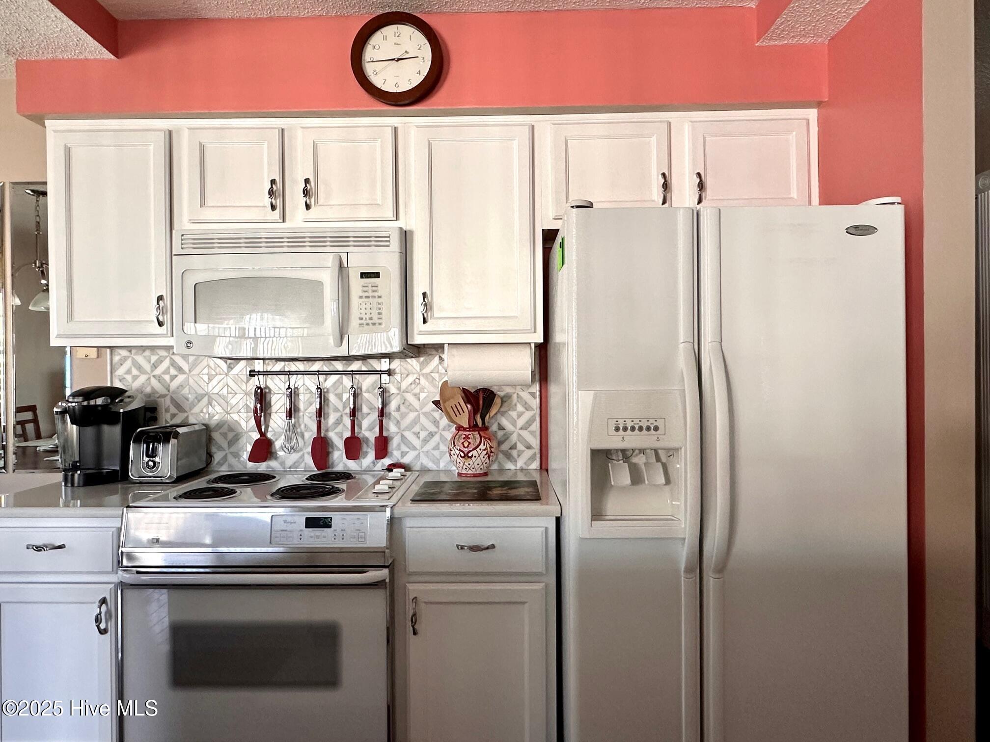 908 Resort Circle, Unit 512 Sunset Beach, NC 28468 - Photo 7 of 33 Cabinets galore