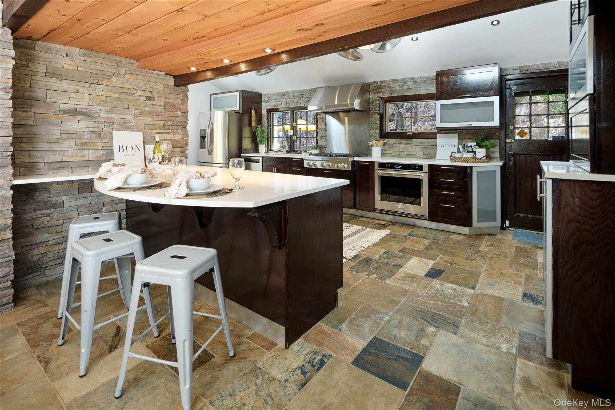 241 West Mt Airy Road Croton-on-Hudson, NY 10520 - Photo 13 of 41 a view of a dining room kitchen counter space and wooden floor