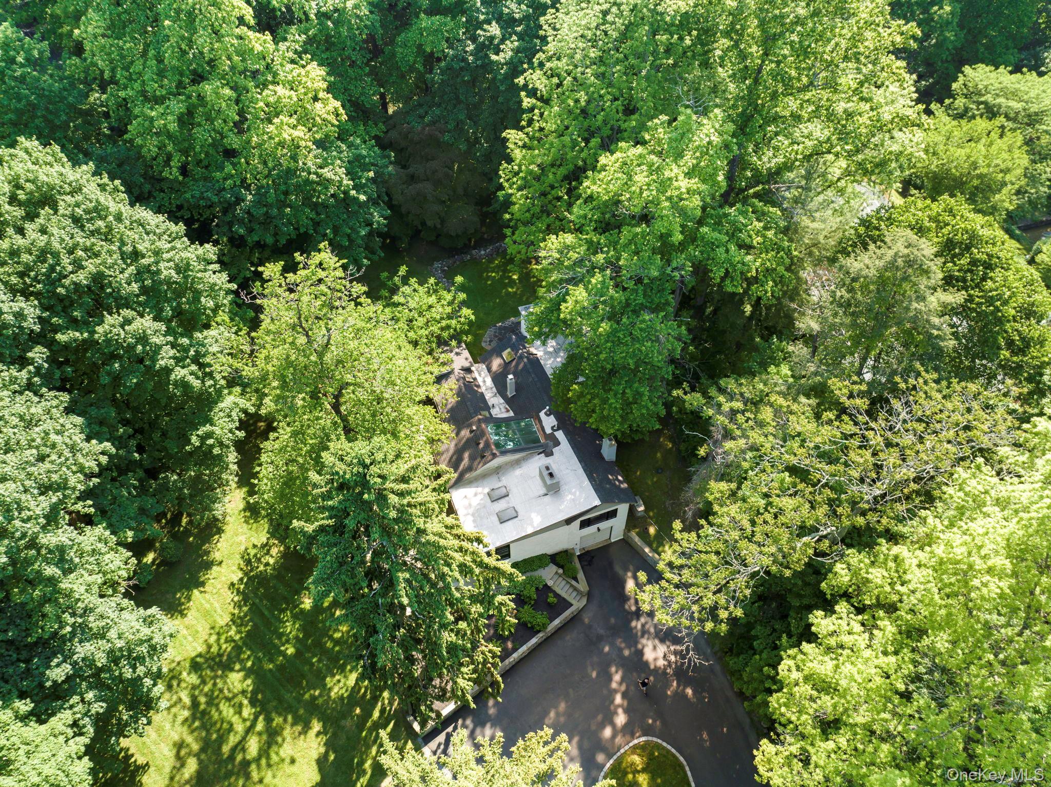 241 West Mt Airy Road Croton-on-Hudson, NY 10520 - Photo 2 of 41 an aerial view of a house with a yard