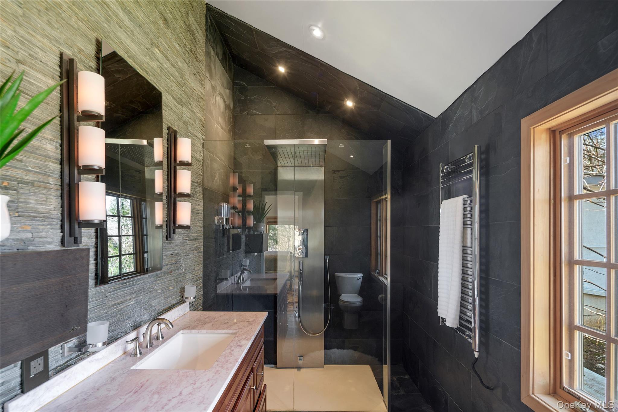 241 West Mt Airy Road Croton-on-Hudson, NY 10520 - Photo 29 of 41 a bathroom with a granite countertop sink a toilet a mirror and shower