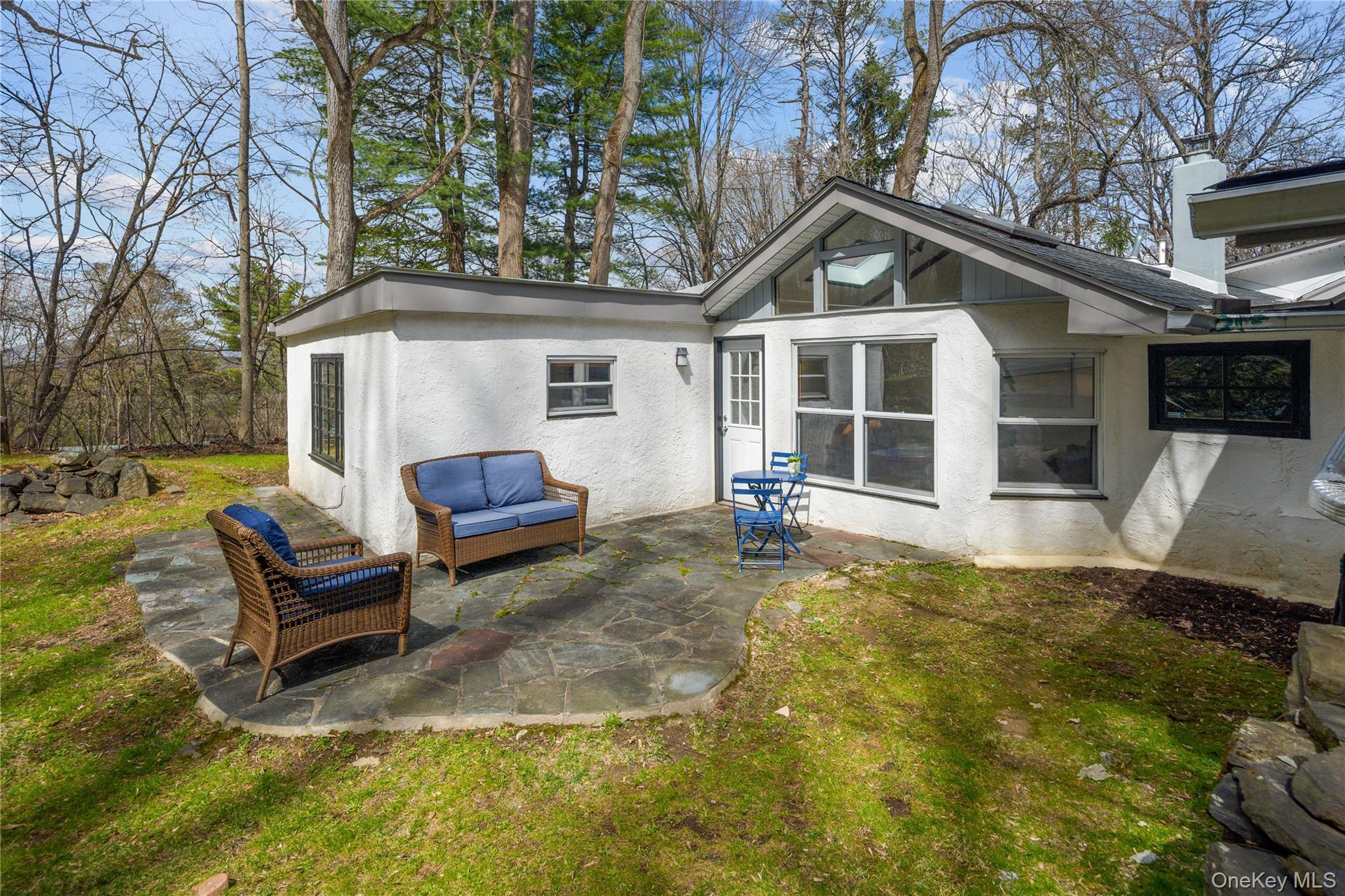 241 West Mt Airy Road Croton-on-Hudson, NY 10520 - Photo 38 of 41 a front view of house with yard outdoor seating and barbeque oven