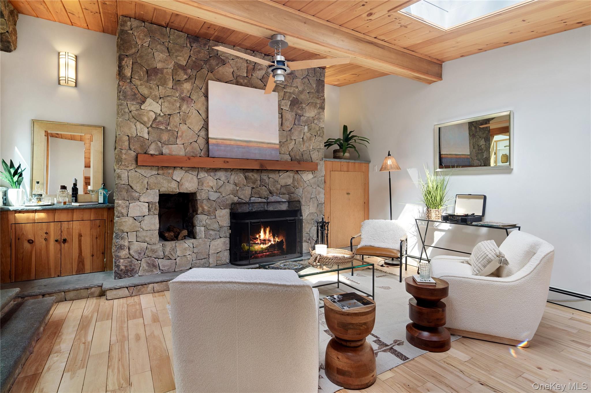 241 West Mt Airy Road Croton-on-Hudson, NY 10520 - Photo 8 of 41 a living room with furniture and a fireplace