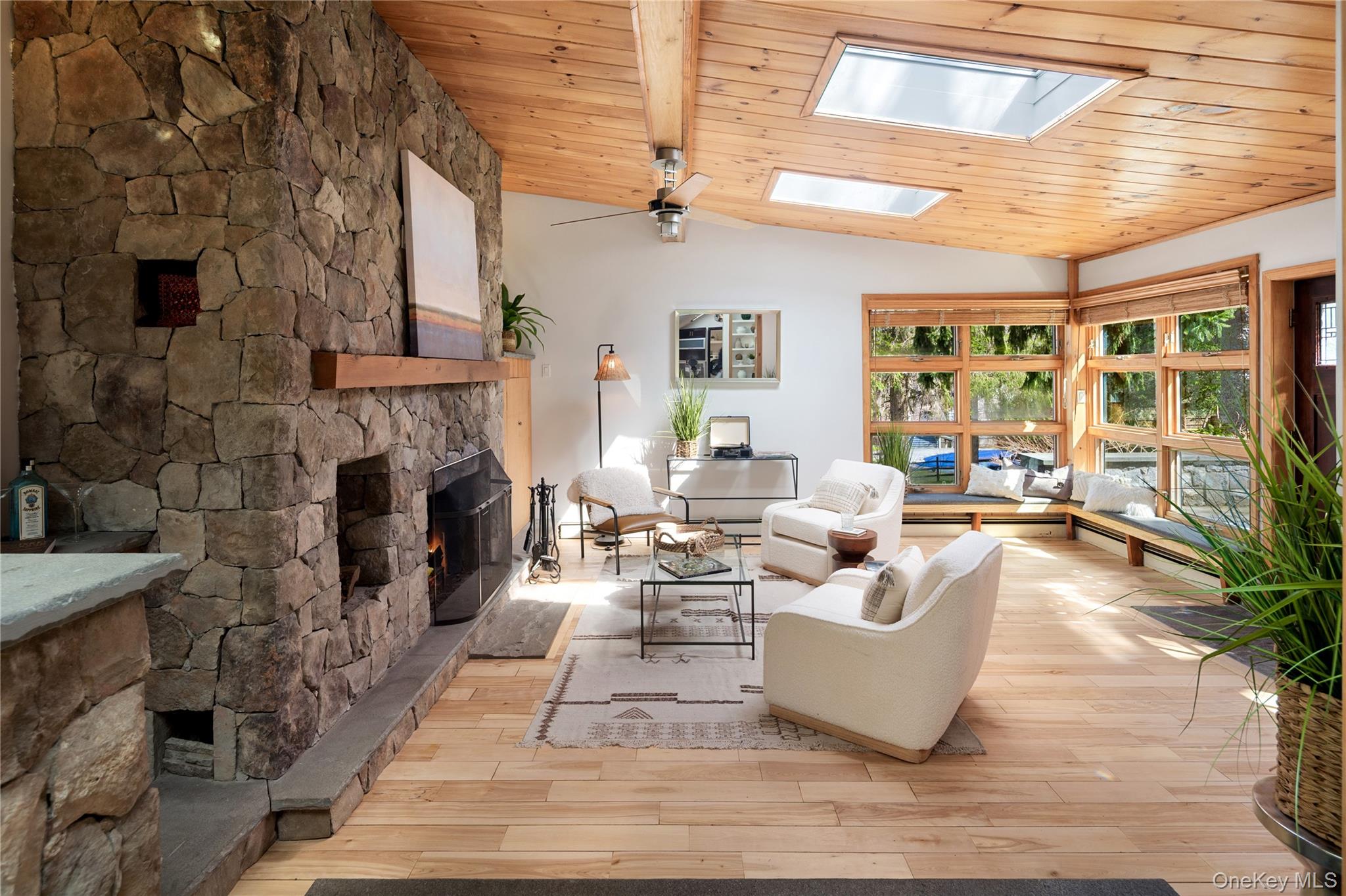 241 West Mt Airy Road Croton-on-Hudson, NY 10520 - Photo 10 of 41 a living room with furniture and a fireplace