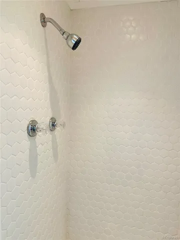 a close view of a bathroom shower