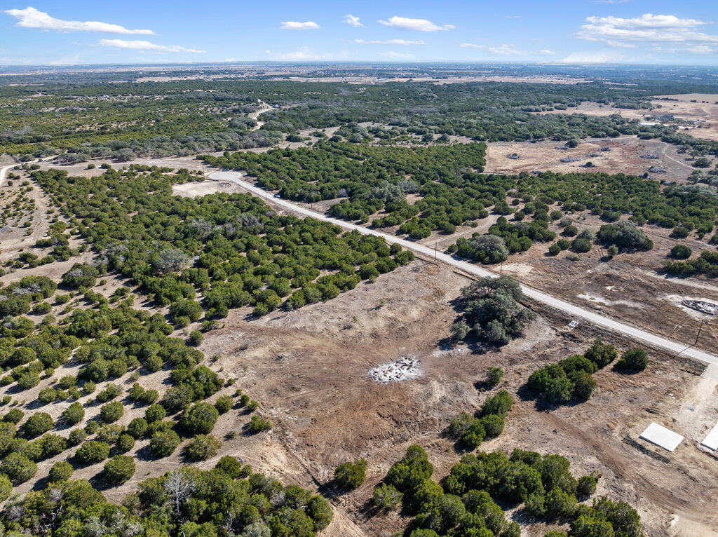 166 Whispering Wind Road Bertram, TX 78605 - Photo 4 of 10 a view of a city with an outdoor space