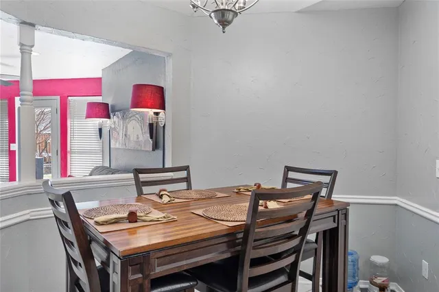 a view of a workspace with furniture