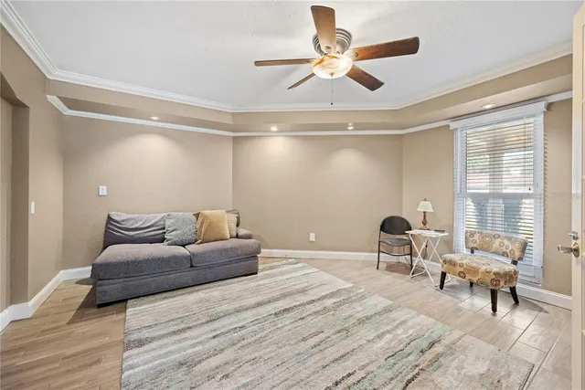a living room with furniture and a table