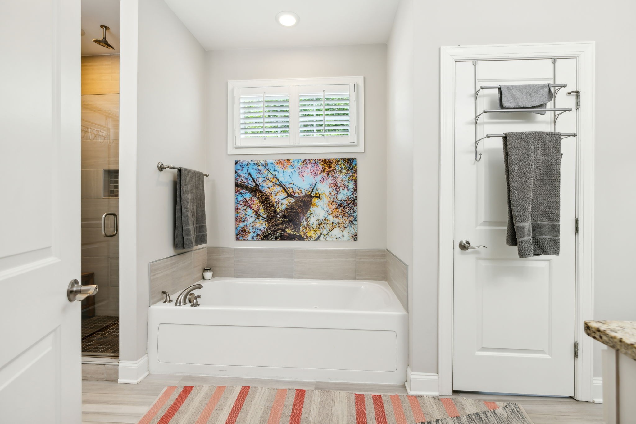 948 Glass Street Franklin, TN 37064 - Photo 16 of 40 a white bath tub sitting next to a small bathroom