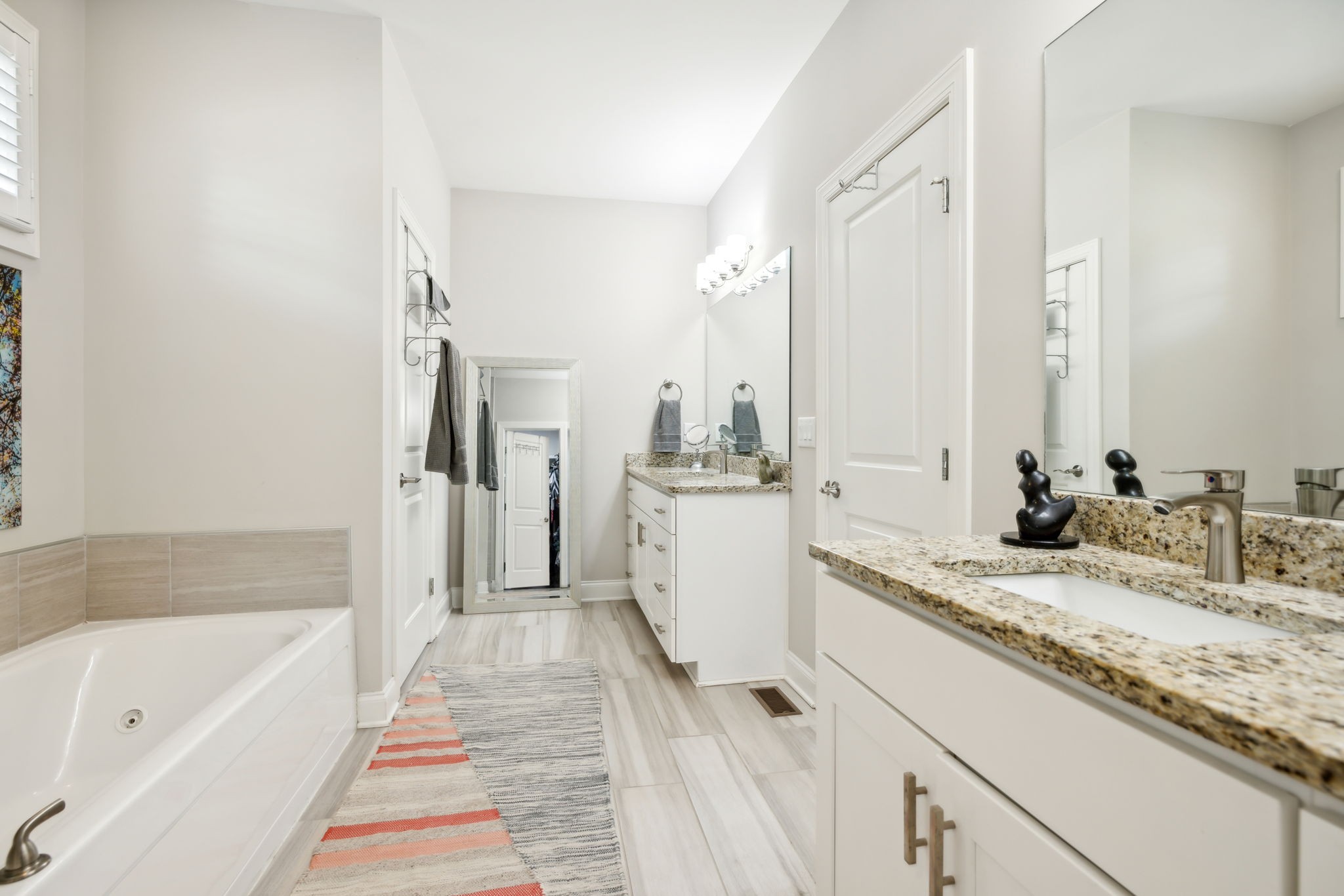 948 Glass Street Franklin, TN 37064 - Photo 17 of 40 a bathroom with a granite countertop sink and a bathtub