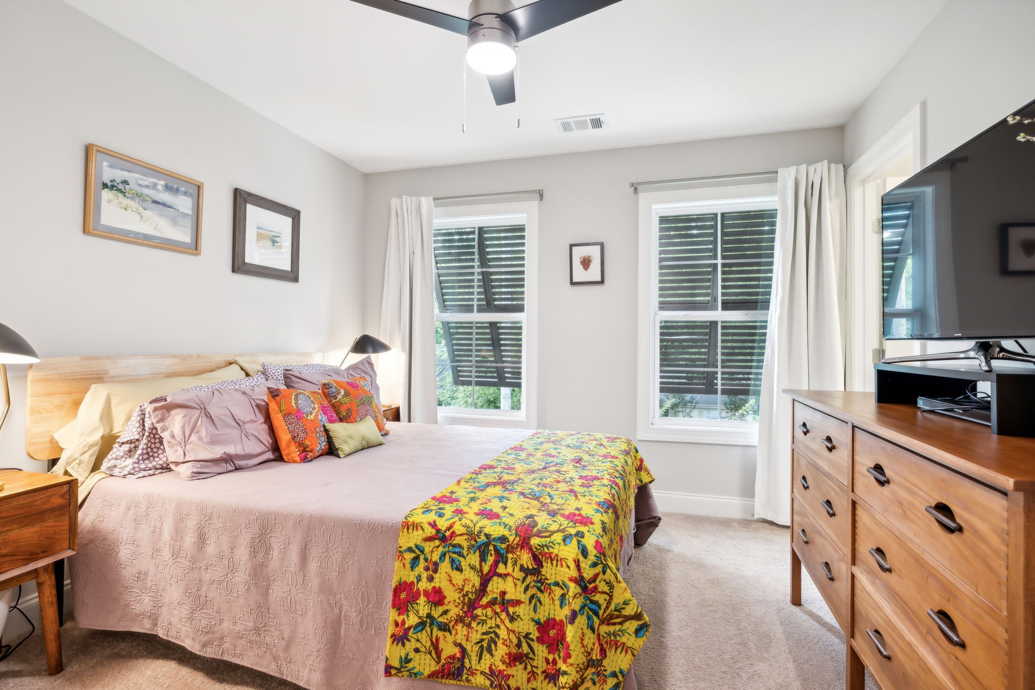 948 Glass Street Franklin, TN 37064 - Photo 21 of 40 a bedroom with a bed and a flat screen tv