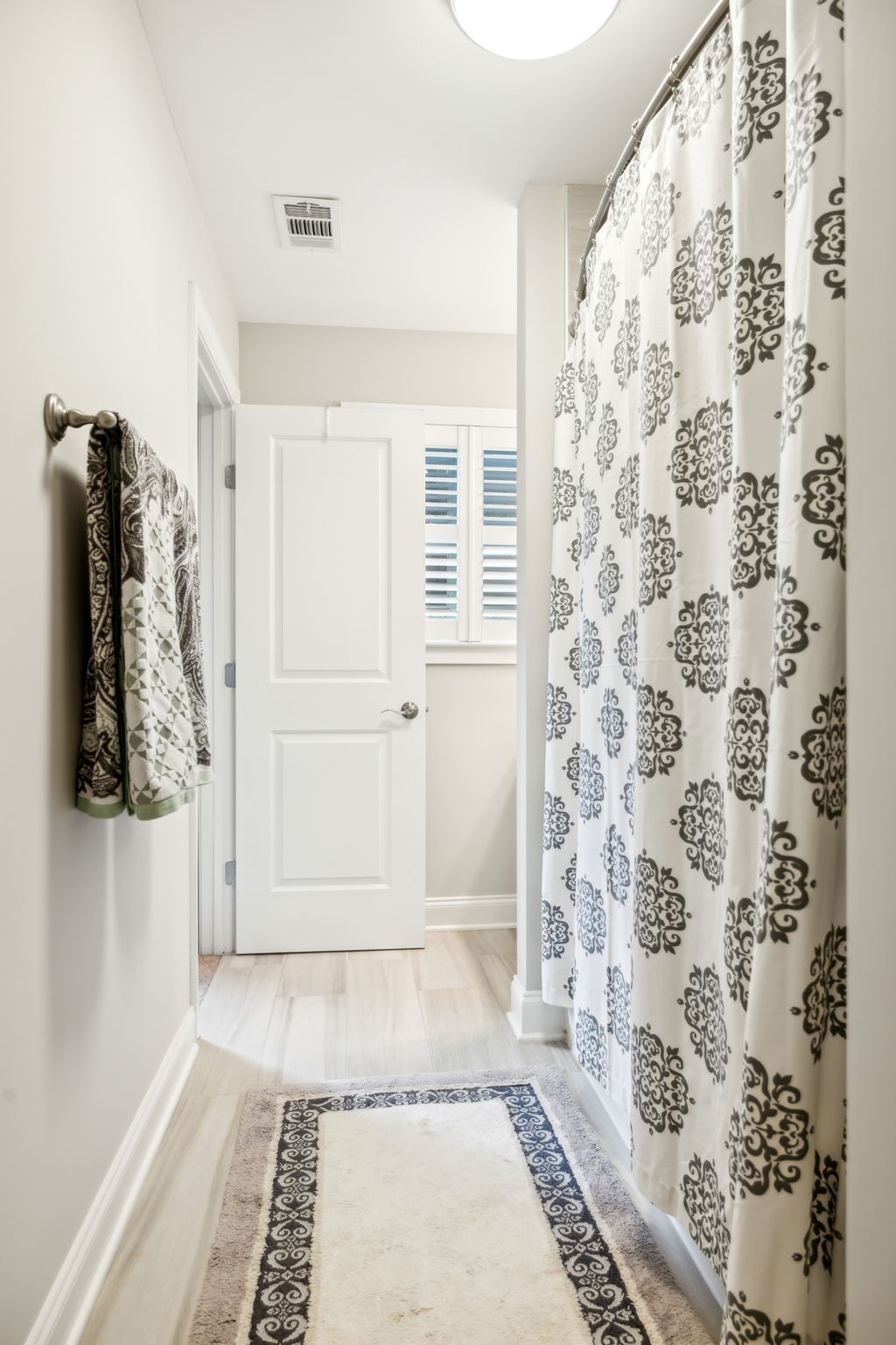 948 Glass Street Franklin, TN 37064 - Photo 23 of 40 a view of bathroom with a shower curtain