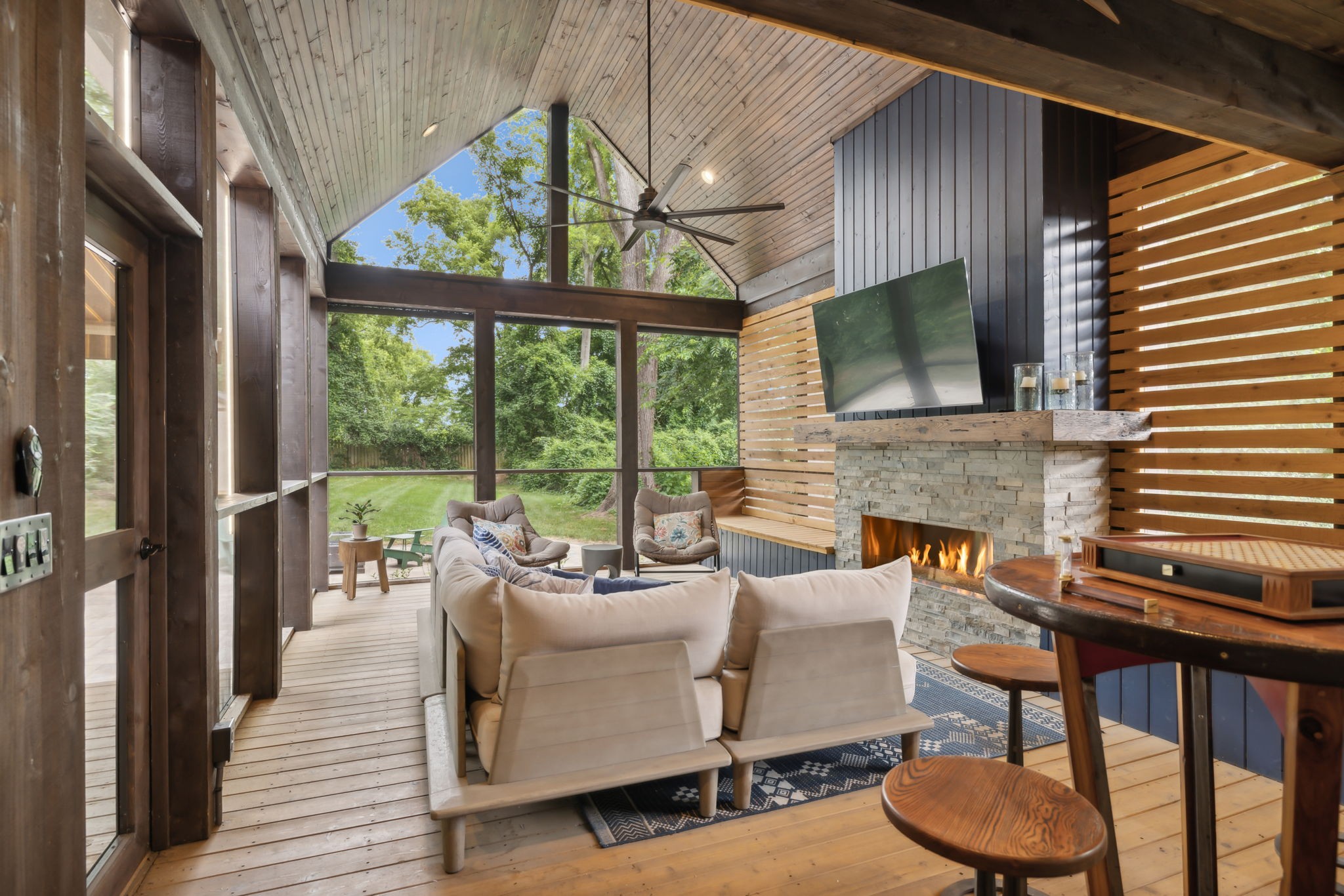 948 Glass Street Franklin, TN 37064 - Photo 26 of 40 a living room with furniture a flat screen tv and a fireplace