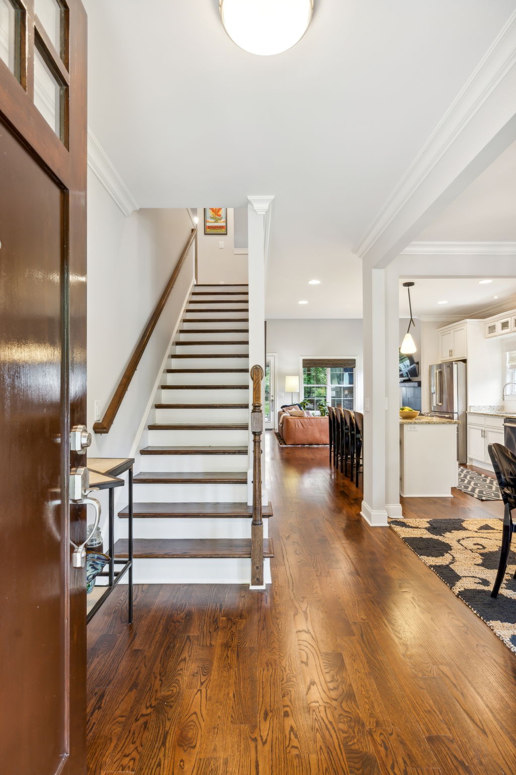 948 Glass Street Franklin, TN 37064 - Photo 3 of 40 a view of a livingroom with furniture and staircase