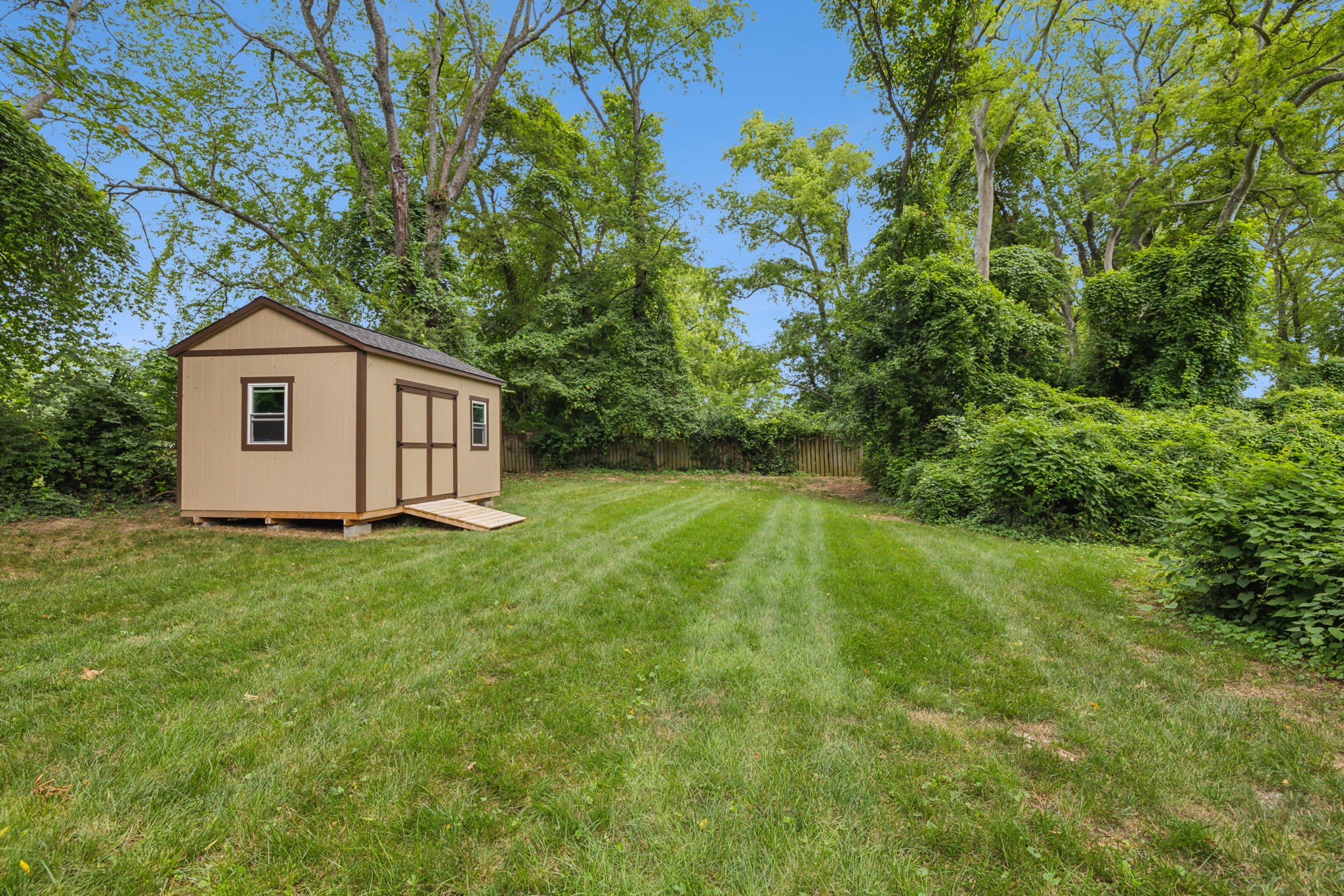 948 Glass Street Franklin, TN 37064 - Photo 36 of 40 a front view of a house with a garden