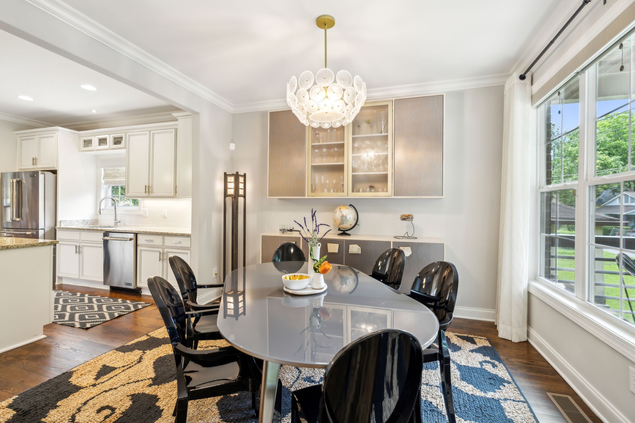 948 Glass Street Franklin, TN 37064 - Photo 4 of 40 a view of a dining room with furniture a chandelier and wooden floor