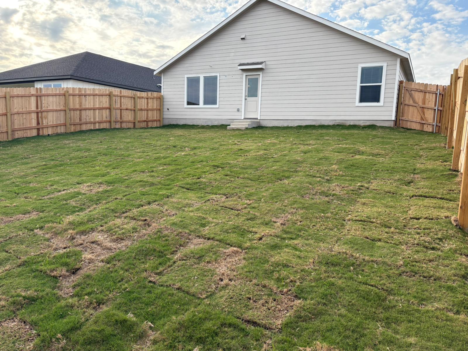 1907 Bear Grass Rdg Road Temple, TX 76501 - Photo 8 of 8 Rear view of property with a fenced backyard