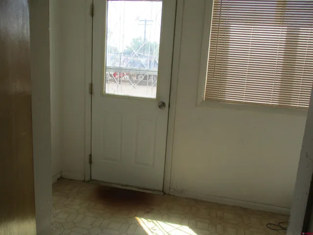 a view of a window in an empty room