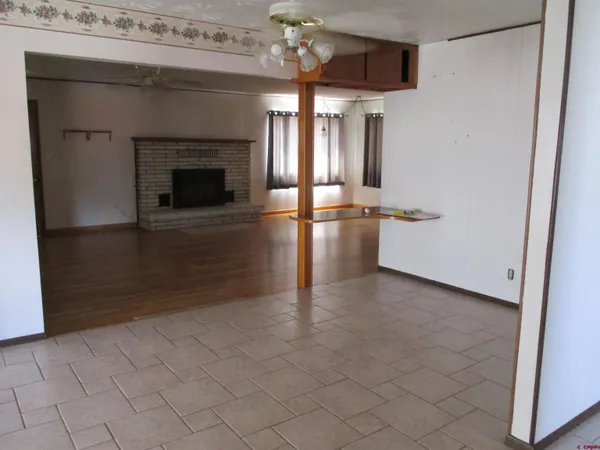 a view of a livingroom with a fireplace
