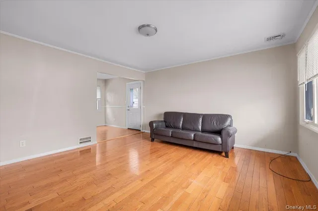 a living room with couches and a coffee table