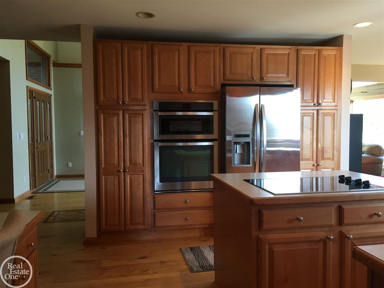 4213 Hosner Road Metamora, MI 48455 - Photo 18 of 57 Island and built in cook top