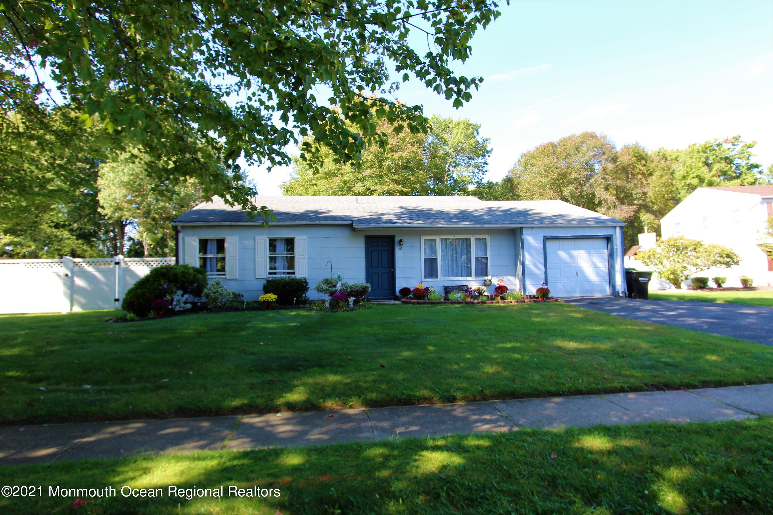 18 Rothbard Road Hazlet, NJ 07730 - Photo 1 of 23 a view of a yard in front of house