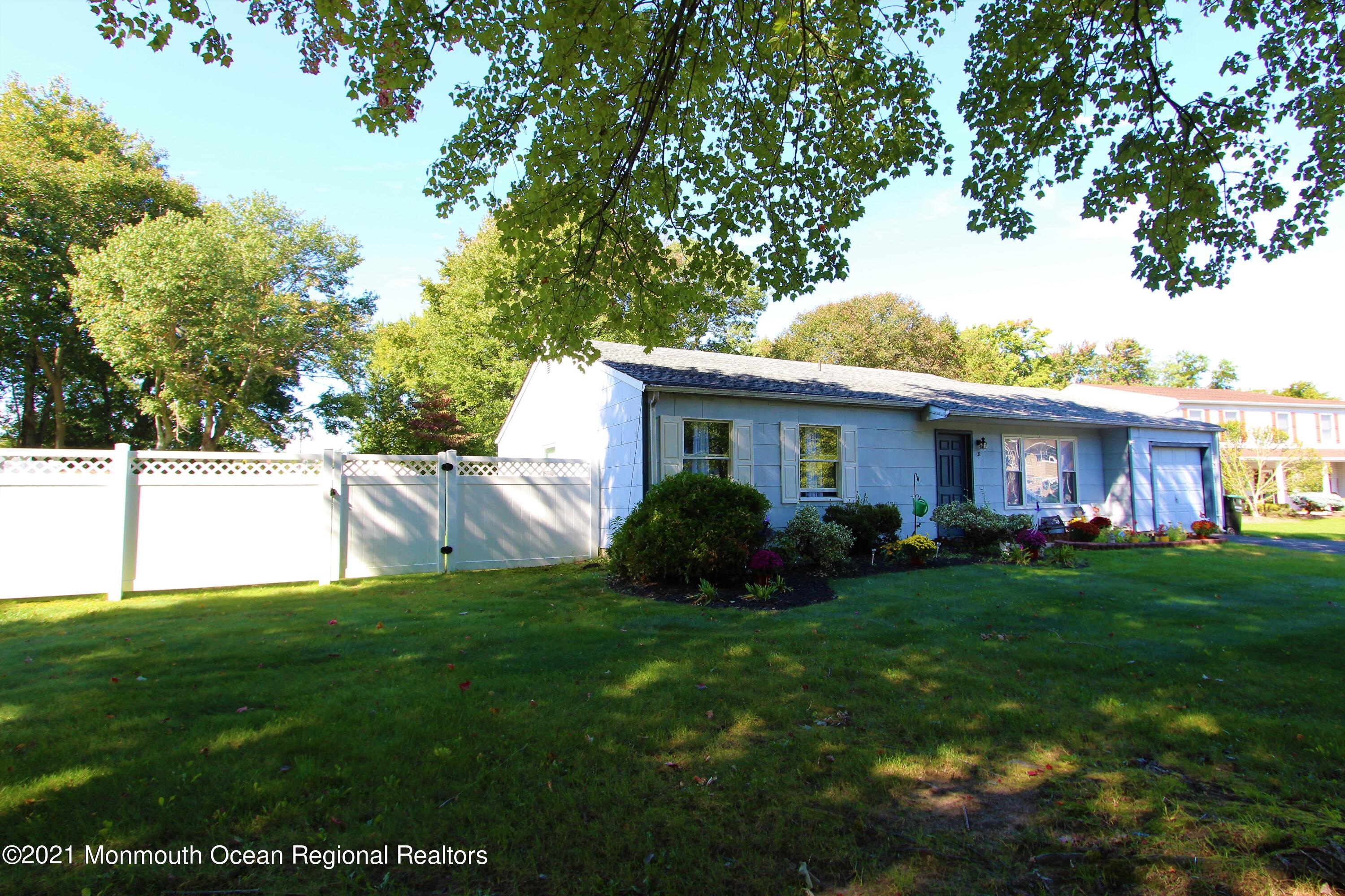 18 Rothbard Road Hazlet, NJ 07730 - Photo 2 of 23 a view of a house with a backyard