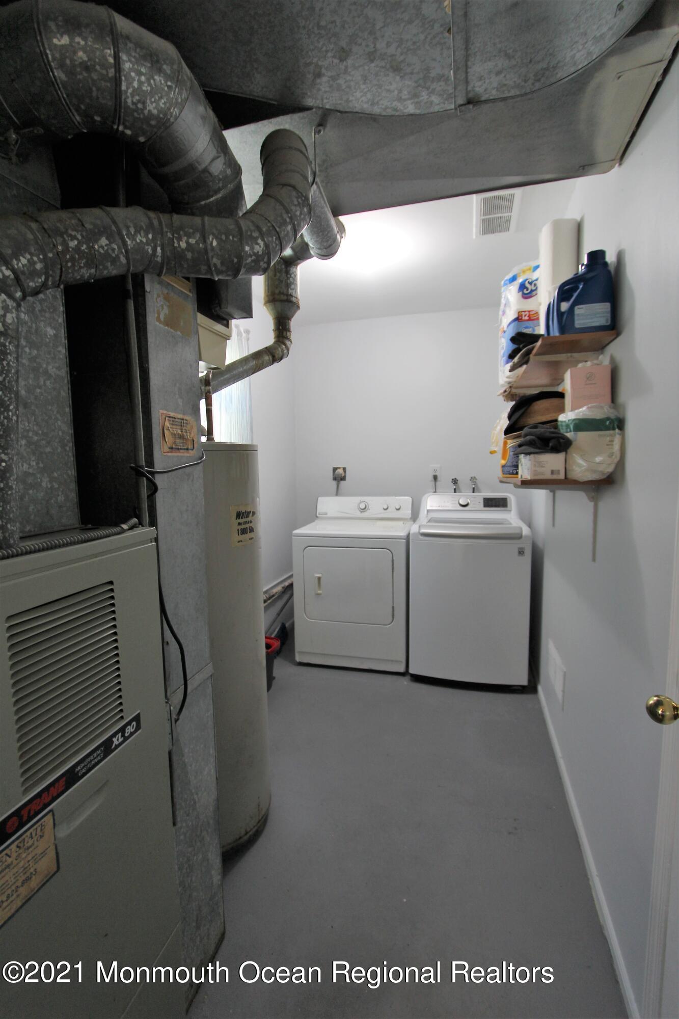 18 Rothbard Road Hazlet, NJ 07730 - Photo 14 of 23 a utility room with dryer and washer