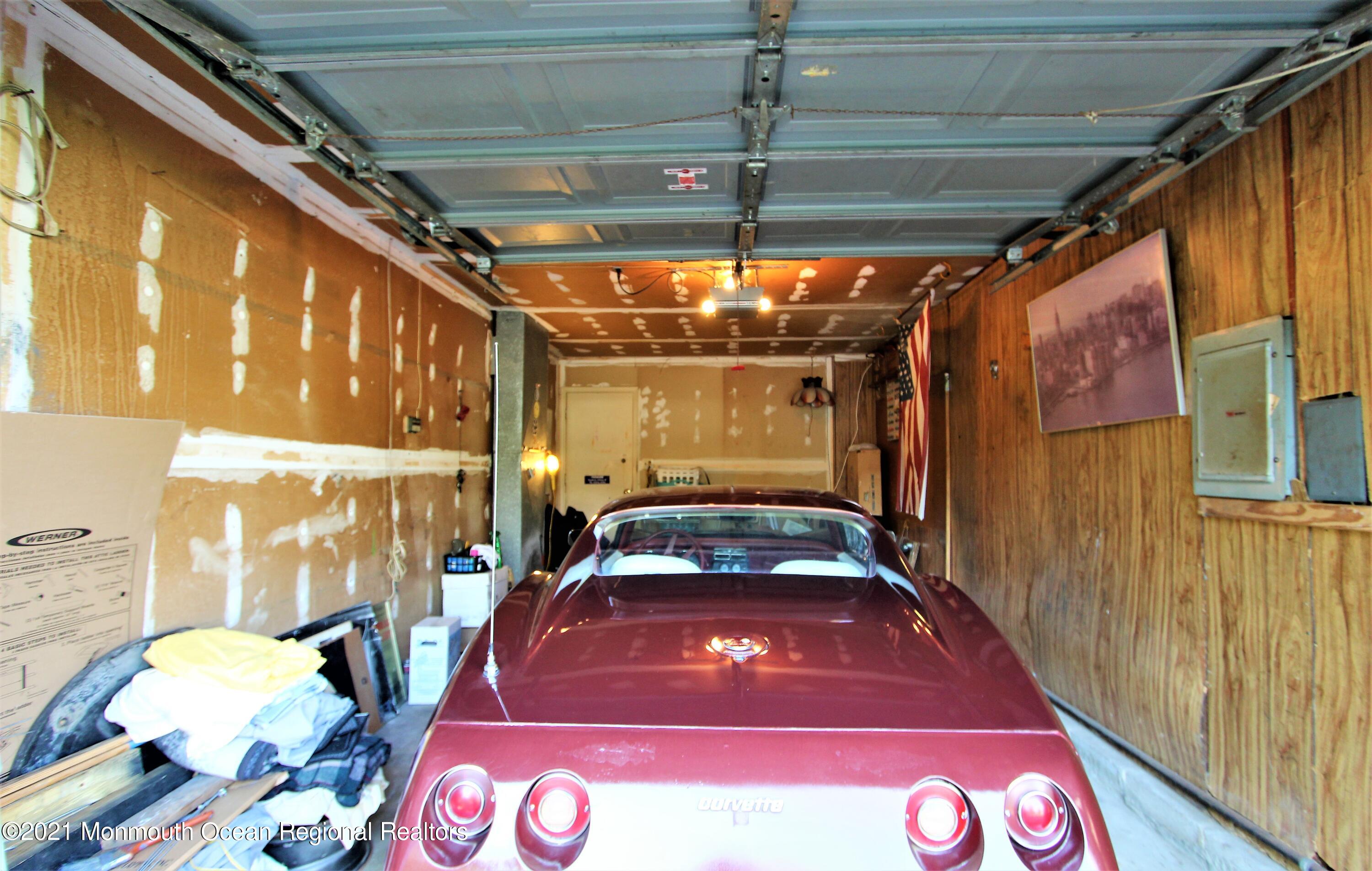 18 Rothbard Road Hazlet, NJ 07730 - Photo 17 of 23 a front view of a house with a garage