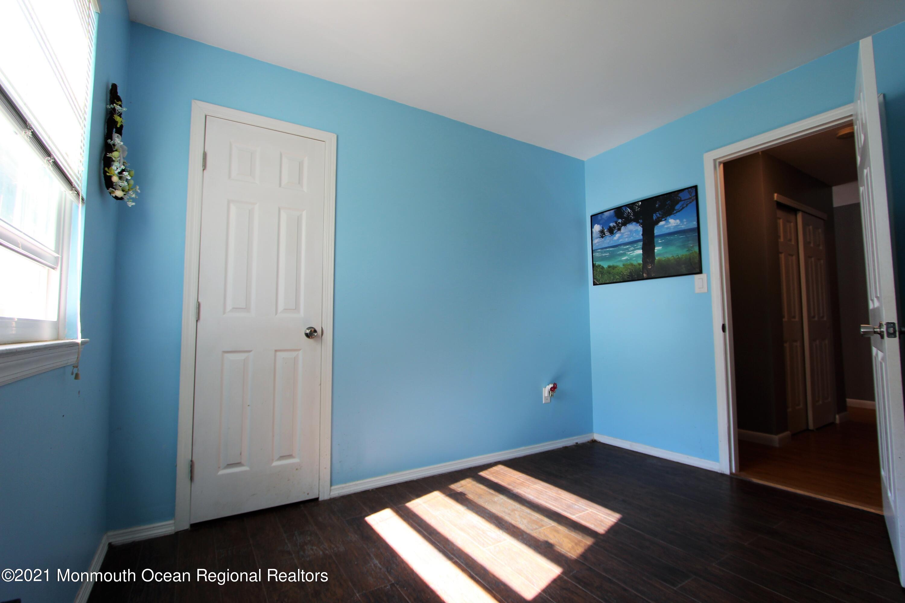 18 Rothbard Road Hazlet, NJ 07730 - Photo 23 of 23 a view of an empty room and window