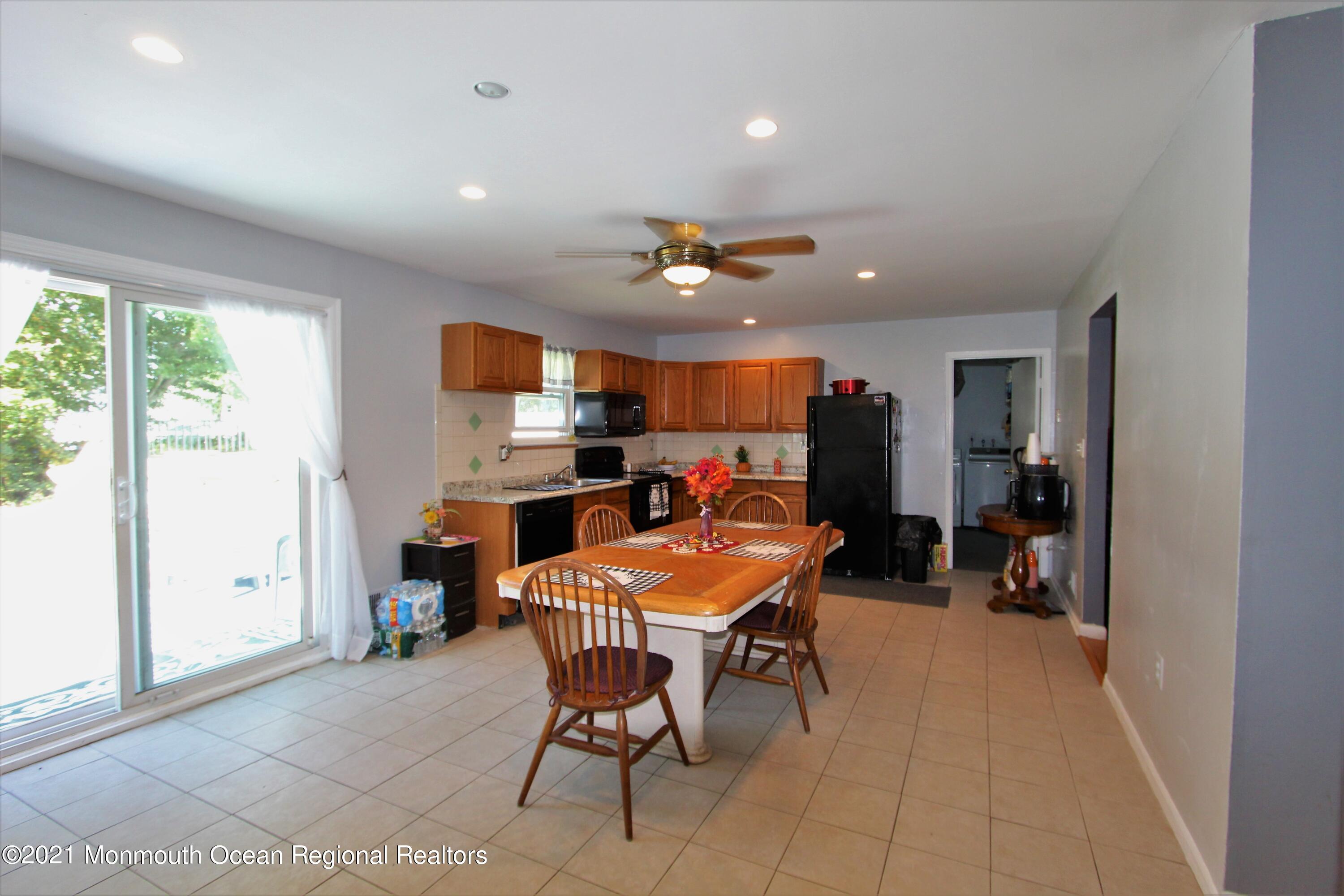 18 Rothbard Road Hazlet, NJ 07730 - Photo 8 of 23 a view of a dining room with furniture window and outside view