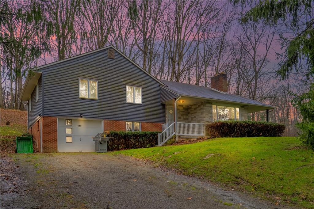 2321 Lovi Road Freedom, PA 15042 - Photo 1 of 35 a front view of house with yard and green space